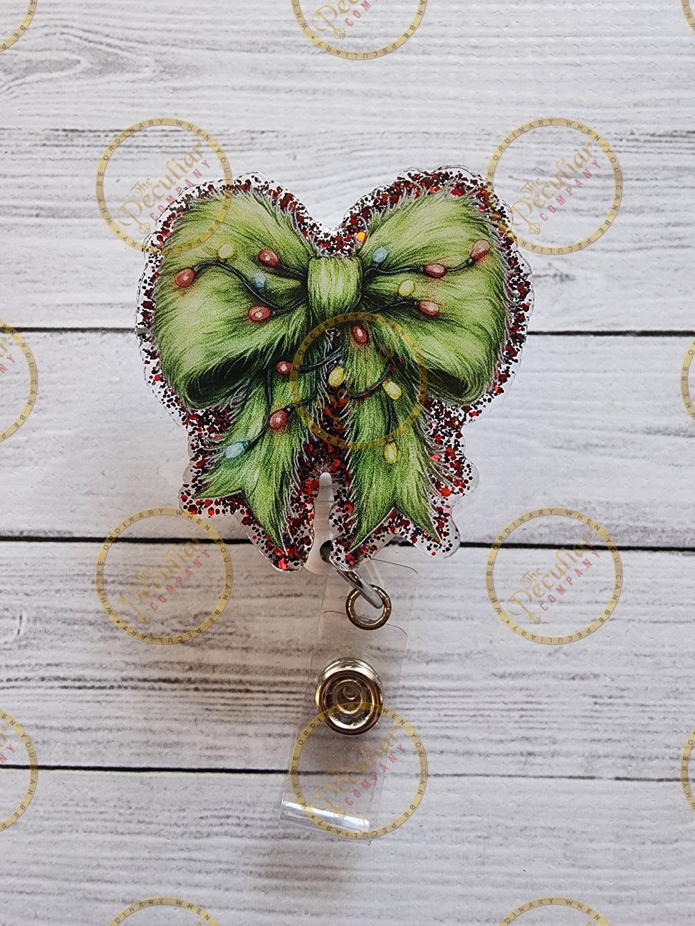 Grinch Tree Lights Bow Badge Reel